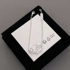 입생로랑 YSL 반 체인 반 큐빅 팔찌